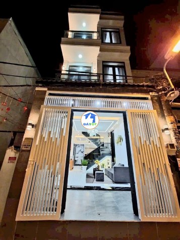 Nhà mới 3 tầng, hẻm xe hơi Huỳnh Tấn Phát, khu dân trí cao, 5 phòng, giá hơn 6