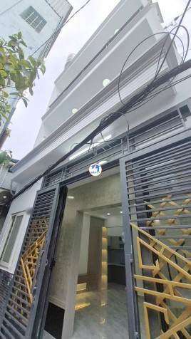 Nhà 2lầu đúc ngang 5.2m cách mặt tiền Nguyễn Duy 30m - 5480000 Tổng diện tích - 39 m²