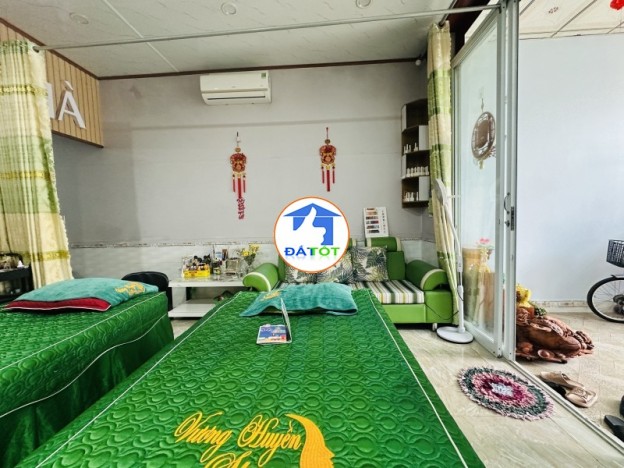 Bán nhà 2 Tầng Dĩ An, Trục chính vừa ở vừa KINH DOANH tốt,đường nhựa 10M,giá rẻ